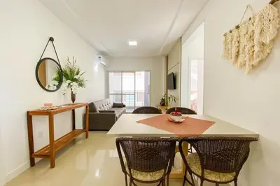 Uma área de estar em Apartamento há poucos metros da praia - 0459