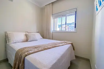 Uma cama ou camas num quarto em Praia de Palmas 300m do Mar com Conforto - 0460
