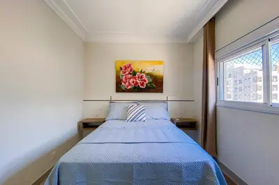 Uma cama ou camas num quarto em Praia de Palmas 300m do Mar com Conforto - 0460