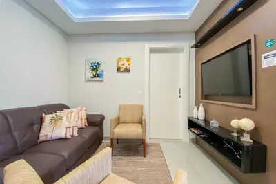 Uma área de estar em Praia de Palmas 300m do Mar com Conforto - 0460