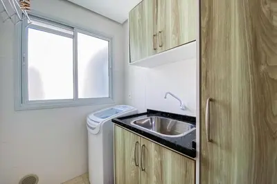 A cozinha ou kitchenette de Amplo apartamento há poucos metros do mar - 0462