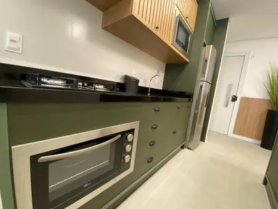 A cozinha ou kitchenette de Praia de Palmas, 450m da Praia, Novo e Garden - 0472