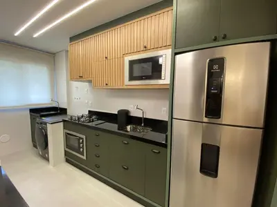 A cozinha ou kitchenette de Praia de Palmas, 450m da Praia, Novo e Garden - 0472