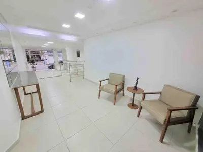 Uma área de estar em Apartamento em Itapema