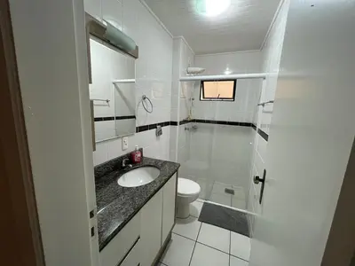 Uma casa de banho em Apartamento em Itapema