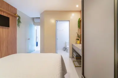 Uma cama ou camas num quarto em Condomínio Costão Náutico