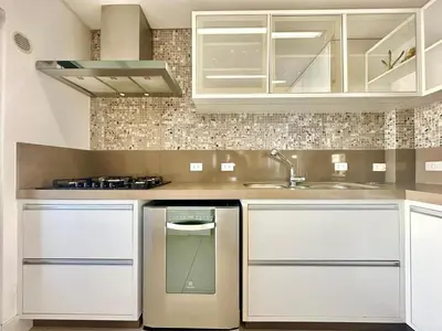 A cozinha ou kitchenette de Achei Itapema • Monte Carlo AP202, R.279