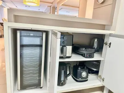 A cozinha ou kitchenette de Achei Itapema • Monte Carlo AP202, R.279