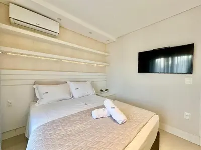 Uma cama ou camas num quarto em Achei Itapema • Monte Carlo AP202, R.279
