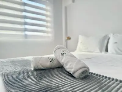 Uma cama ou camas num quarto em Achei Itapema • Príncipe da Beira, R.277