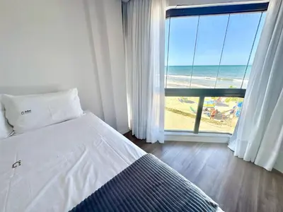 Uma cama ou camas num quarto em Achei Itapema • Príncipe da Beira, R.277