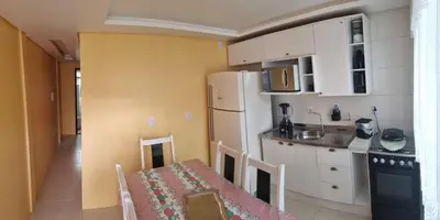 A cozinha ou kitchenette de Casa 600 mts da praia do Simao Canto dos Ganchos
