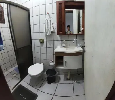 Uma casa de banho em Suíte Nostalgia Ar refrigerado TV55
