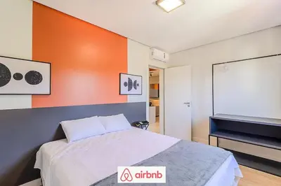 Uma cama ou camas num quarto em Apartamento novíssimo a 5 minutos Barra Sul