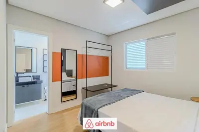 Uma cama ou camas num quarto em Apartamento novíssimo a 5 minutos Barra Sul