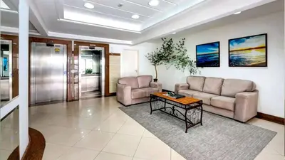 Uma área de estar em Excelente apartamento em Balneário Camboriú