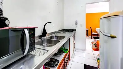 A cozinha ou kitchenette de Excelente apartamento em Balneário Camboriú