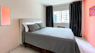 Uma cama ou camas num quarto em Excelente apartamento em Balneário Camboriú
