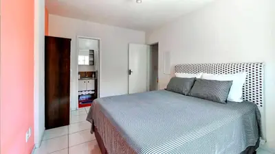 Uma cama ou camas num quarto em Excelente apartamento em Balneário Camboriú