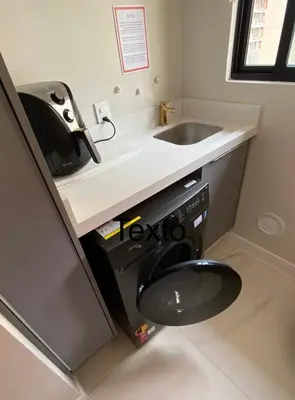 A cozinha ou kitchenette de 2 SUITES COM PISCINA E JACUZZI VISTA Mar ITAPEMA