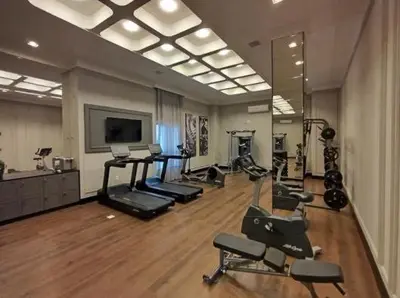 O centro de fitness e/ou as comodidades de fitness de 2 SUITES COM PISCINA E JACUZZI VISTA Mar ITAPEMA