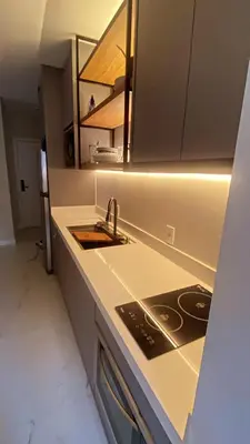 A cozinha ou kitchenette de 2 SUITES COM PISCINA E JACUZZI VISTA Mar ITAPEMA