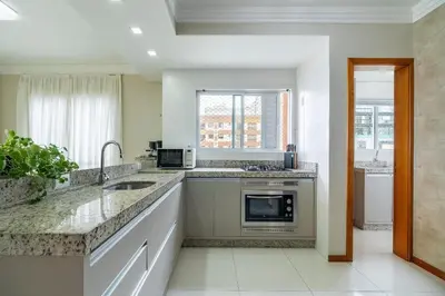 A cozinha ou kitchenette de Achei Itapema • Residencial Olympio, R.255