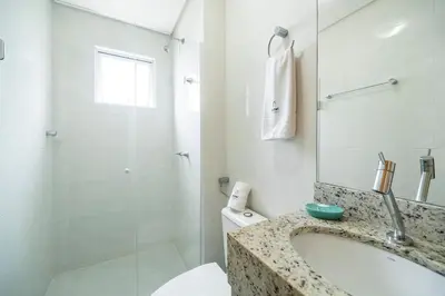 Uma casa de banho em Achei Itapema • Residencial Olympio, R.255