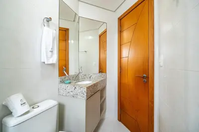 Uma casa de banho em Achei Itapema • Residencial Olympio, R.255
