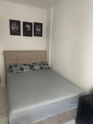 Uma cama ou camas num quarto em Jardim das Américas