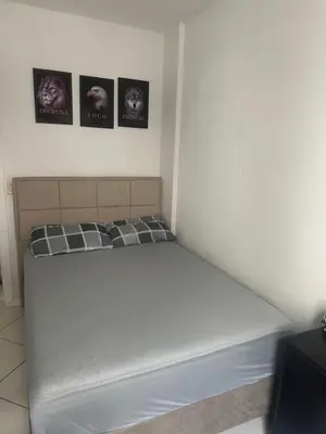 Uma cama ou camas num quarto em Jardim das Américas