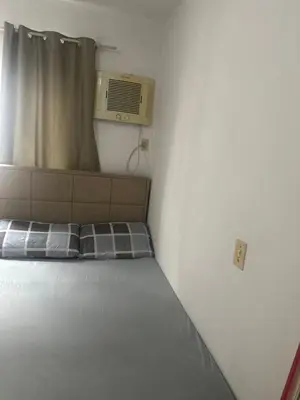 Uma cama ou camas num quarto em Jardim das Américas