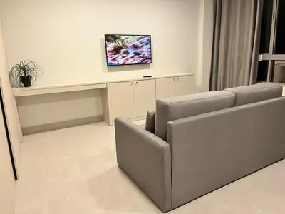 Uma televisão e/ou sistema de entretenimento em Bombinhas Flat 4 pessoas