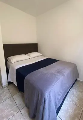Uma cama ou camas num quarto em Casa Dê - Hostel