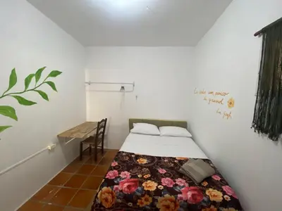 Uma cama ou camas num quarto em Casa Dê - Hostel