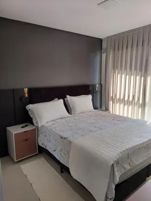 Uma cama ou camas num quarto em Excelente apto próximo a praia