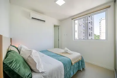 Uma cama ou camas num quarto em Achei Itapema • 1101B, Mirante das Oliveiras