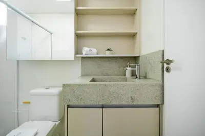 Uma casa de banho em Achei Itapema • 1101B, Mirante das Oliveiras