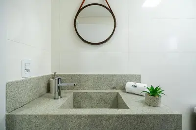 Uma casa de banho em Achei Itapema • 1101B, Mirante das Oliveiras