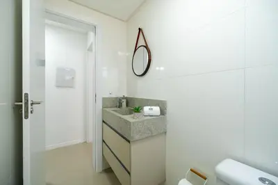 Uma casa de banho em Achei Itapema • 1101B, Mirante das Oliveiras
