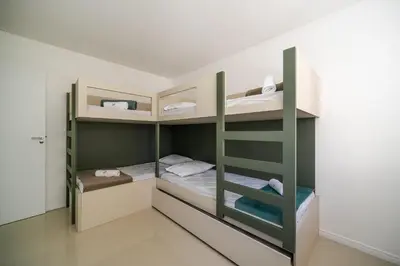 Uma cama ou camas num quarto em Achei Itapema • 1101B, Mirante das Oliveiras
