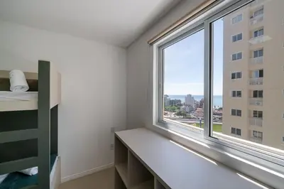 Uma cama ou camas num quarto em Achei Itapema • 1101B, Mirante das Oliveiras