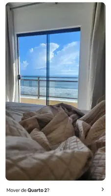 Uma cama ou camas num quarto em Ap frente mar Meia praia