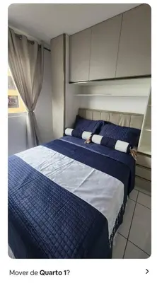 Uma cama ou camas num quarto em Ap frente mar Meia praia