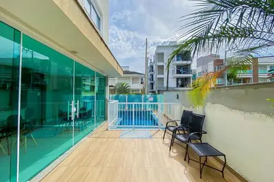 Uma varanda ou terraço em Espaçoso Apt com 3 Quartos na Praia de Palmas 0322