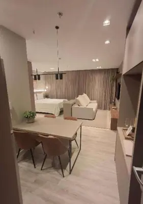 Uma cama ou camas num quarto em Flat Infinity Tower Meia Praia