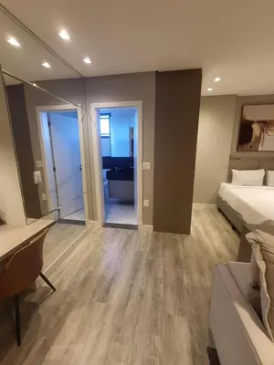 Uma cama ou camas num quarto em Flat Infinity Tower Meia Praia