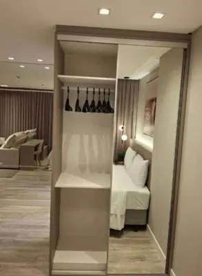 Uma cama ou camas num quarto em Flat Infinity Tower Meia Praia