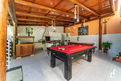 Uma mesa de bilhar em Residencial Lynary – Loft Marte