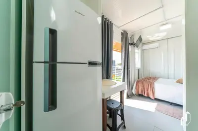 Uma cama ou camas num quarto em Residencial Lynary – Loft Marte